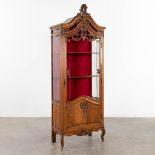 A display cabinet, sculptured wood in Louis XV style. (D:36 x W:70 x H:180 cm)