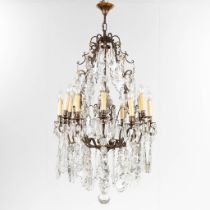A big antique chandelier, brass and glass. France. Circa 1900. (H:122 x D:66 cm)