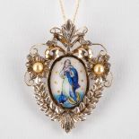 An antique hanger with a porcelain plaque of Madonna on a crescent moon, gold and silver. 10,10g.