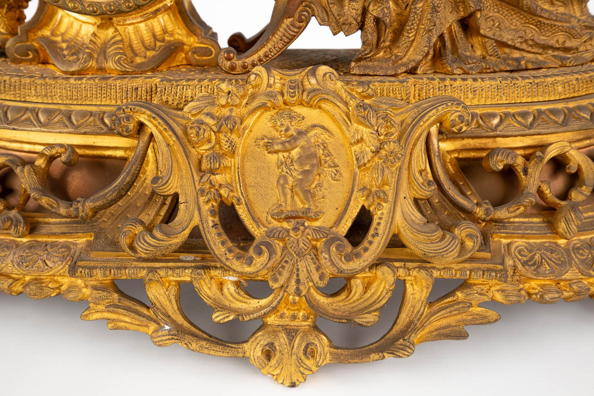 A mantle garniture clock, gilt bronze decorated with a Lady in a sofa. Late 19th C. (D:18 x W:56 x H - Image 11 of 14