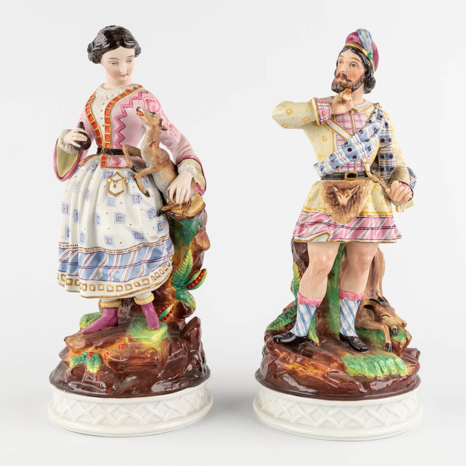 A pair of bisque porcelain figurines with images of the hunt, probably England. 19th C. (H:29 cm)