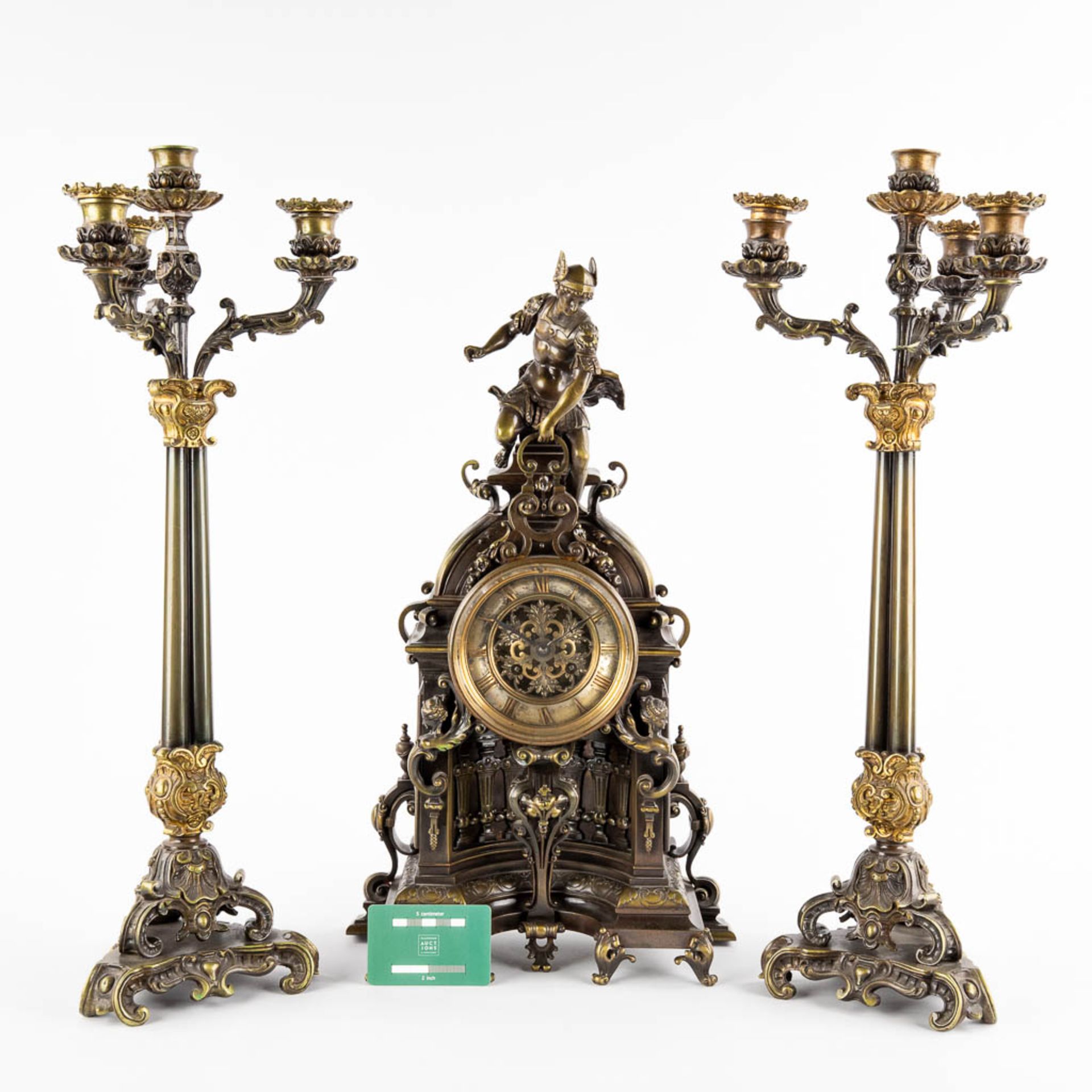 A three-piece mantle garniture clock and candelabra. Clock with an image of Mercury/Hermès. 19th C. - Image 2 of 14