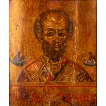 An antique Russian Icon depicting Saint Nicholas of Myra. (W:22,5 x H:25 cm)