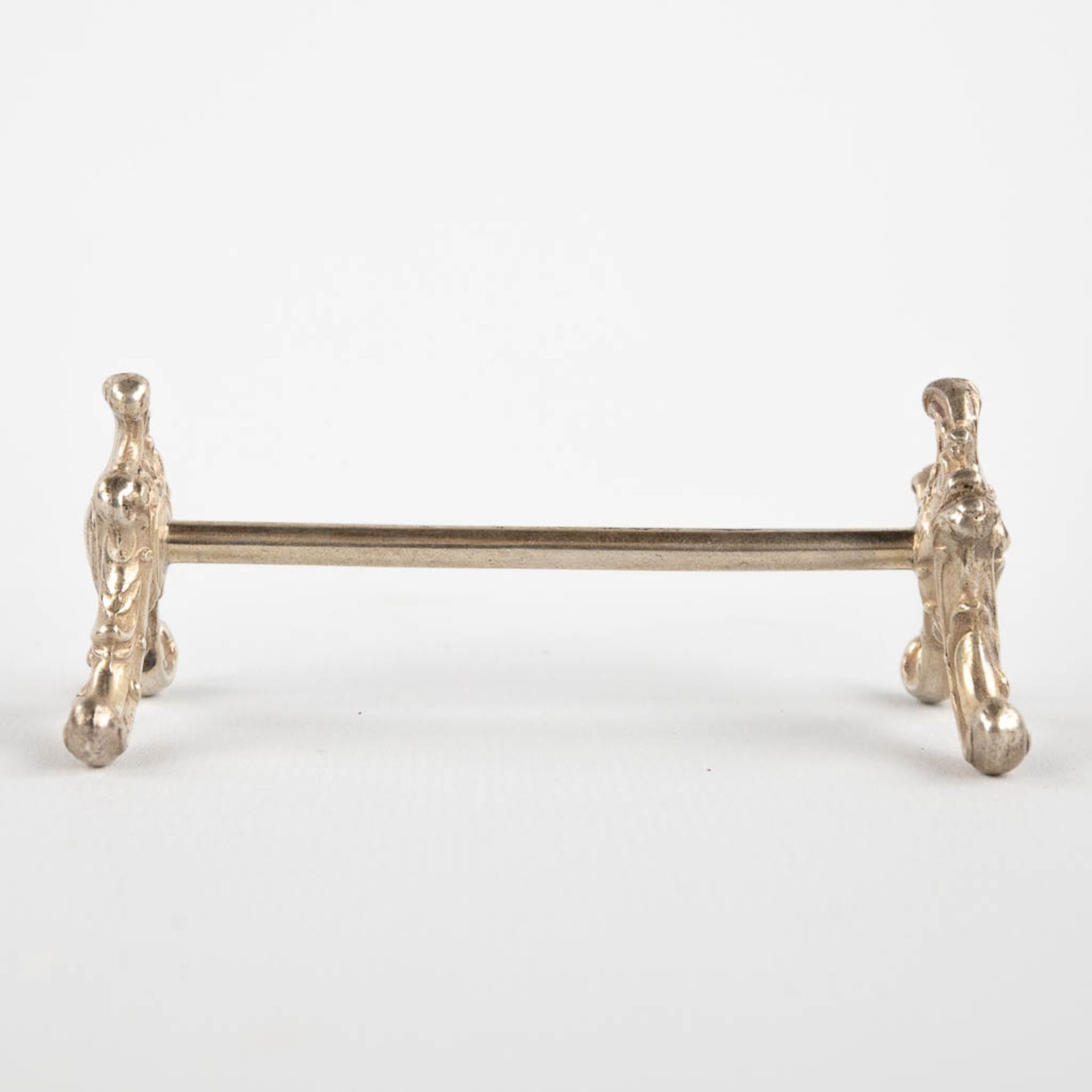 12 silver knife rests, Louis XV style, Germany. 324g. (D:9 x H:3,5 cm) - Image 8 of 9