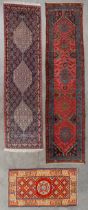 Three Oriental hand-made carpets, of which two runners, Bidjar. (D:300 x W:74 cm)