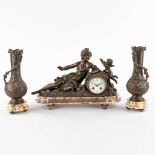 A three-piece garniture clock and side pieces, decorated of a lady with an angel, spelter on marble.