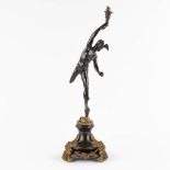 Mercury or Hermes with a Torch, patinated and gilt bronze. Circa 1900. (D:17 x W:22 x H:54 cm)