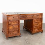 An English desk with a leather top. 19th C. (W:142 x H:78 cm)