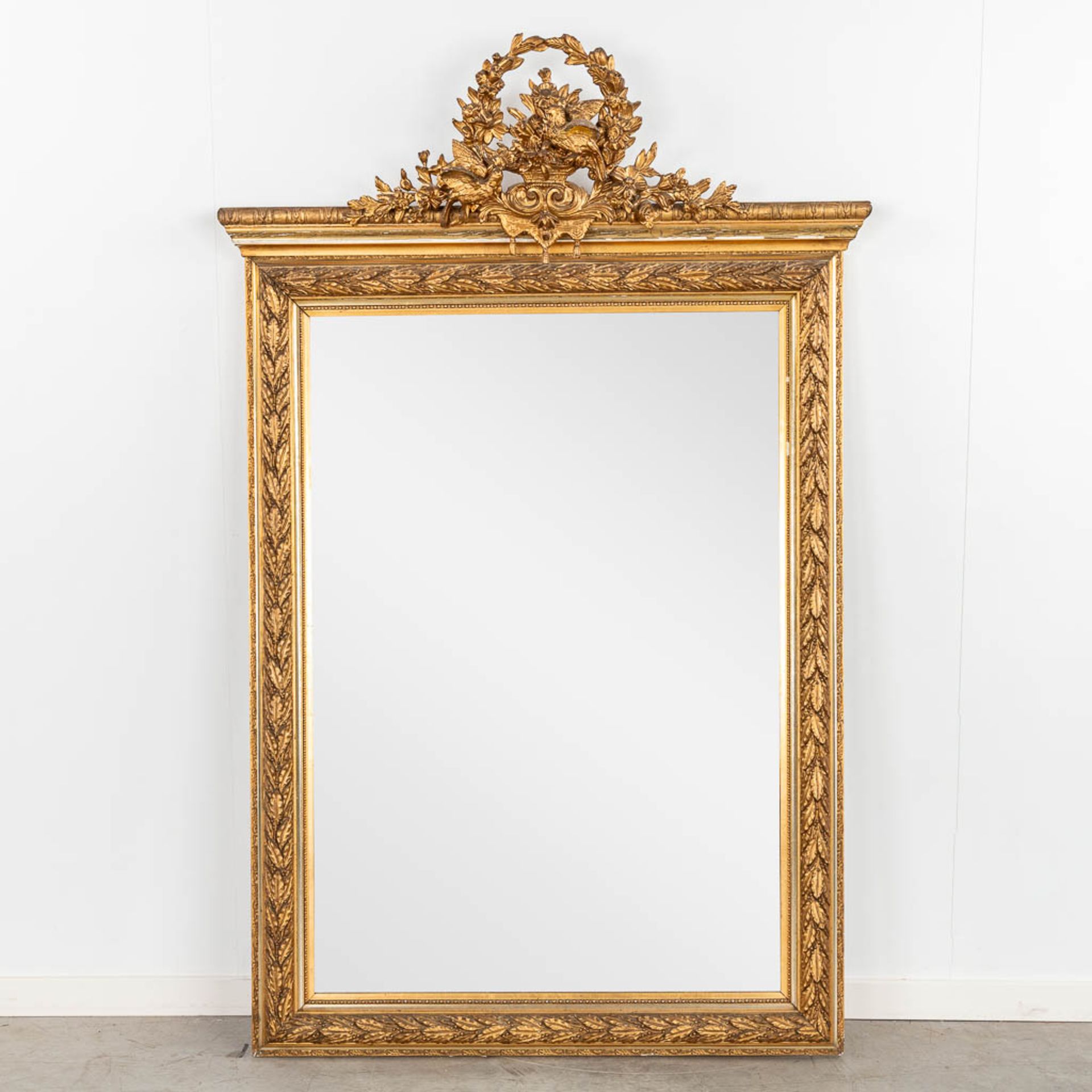 An antique mirror decorated with 'Lovebirds', circa 1900. (W:103 x H:162 cm)