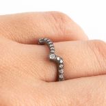 A ring, oxidized silver with briliants, ring size 54. 2,81g.