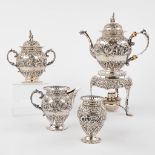 A four-piece tea service, teapot, sugarpot, milk jug and spoon jar, The Netherlands, 19th C. Marked