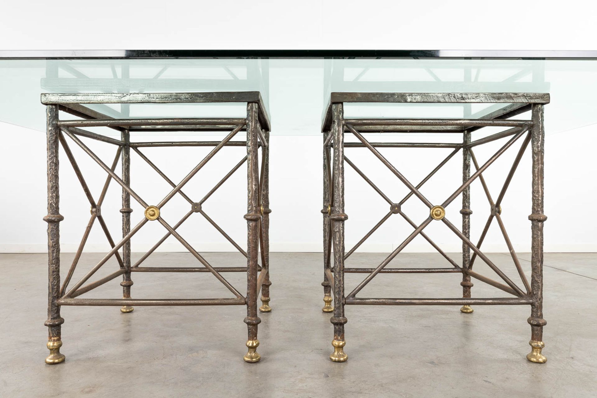 A table with large glass top and a wrought-iron and brass base. (D:120 x W:220 x H:74 cm) - Image 6 of 10