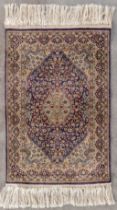 An Oriental hand-made carpet. Kashan. (D:96 x W:64 cm)