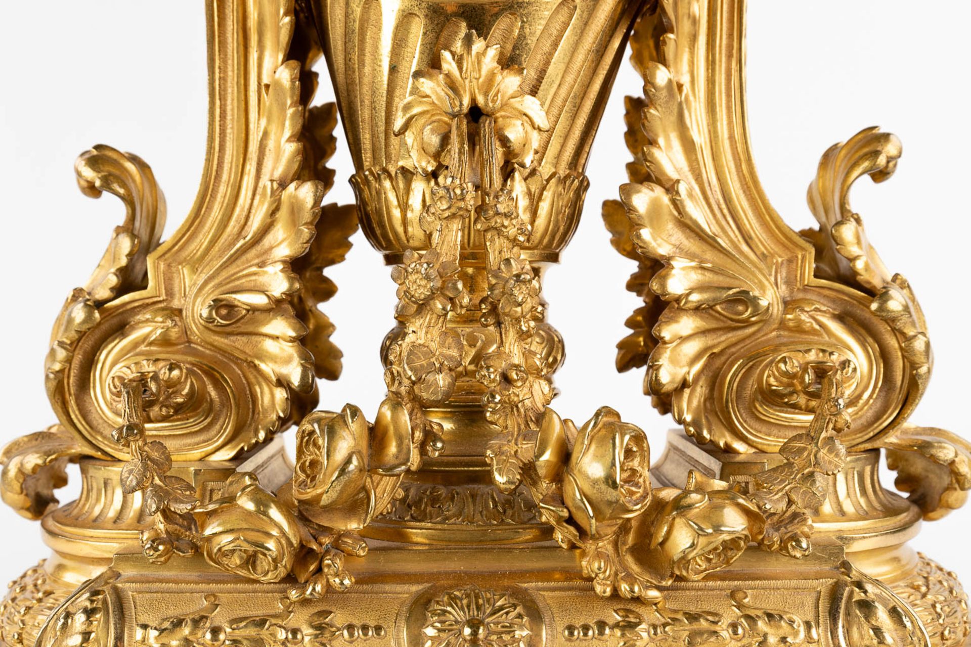 A three-piece mantle garniture clock and candelabra, gilt bronze in a Louis XVI style, 19th C. (D:19 - Image 18 of 19