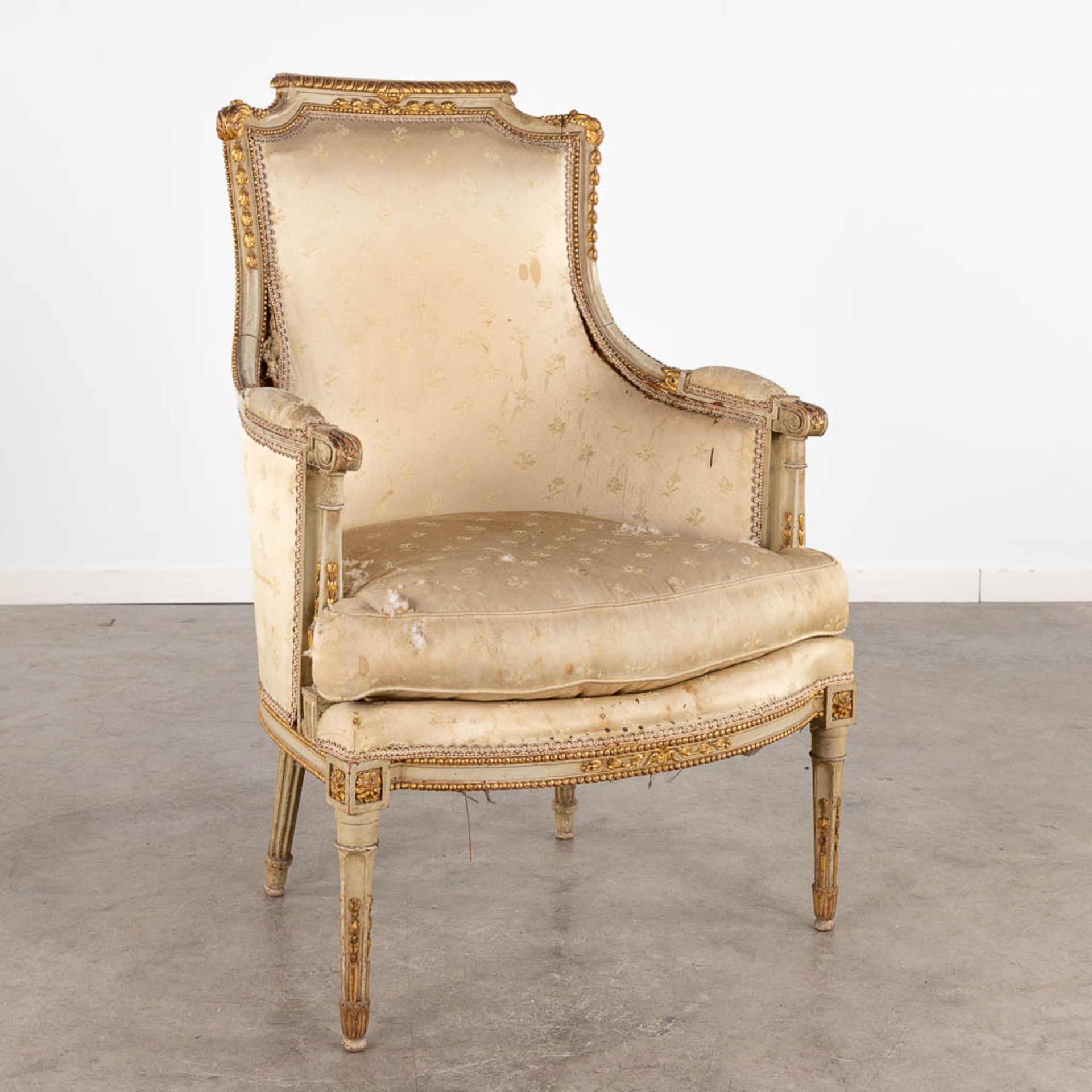 A sculptured armchair, Louis XVI style, 19th C. (D:64 x W:65 x H:100 cm)