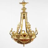 A chandelier, bronze with alabaster, decorated with putti and ram's heads, Louis XVI style. Circa 19