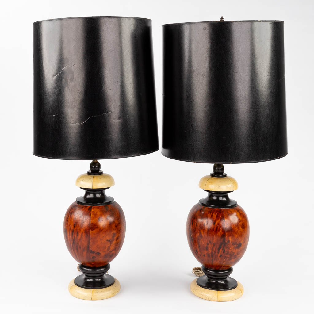 A decorative pair of wood table lamps. (H:94 x D:45 cm)