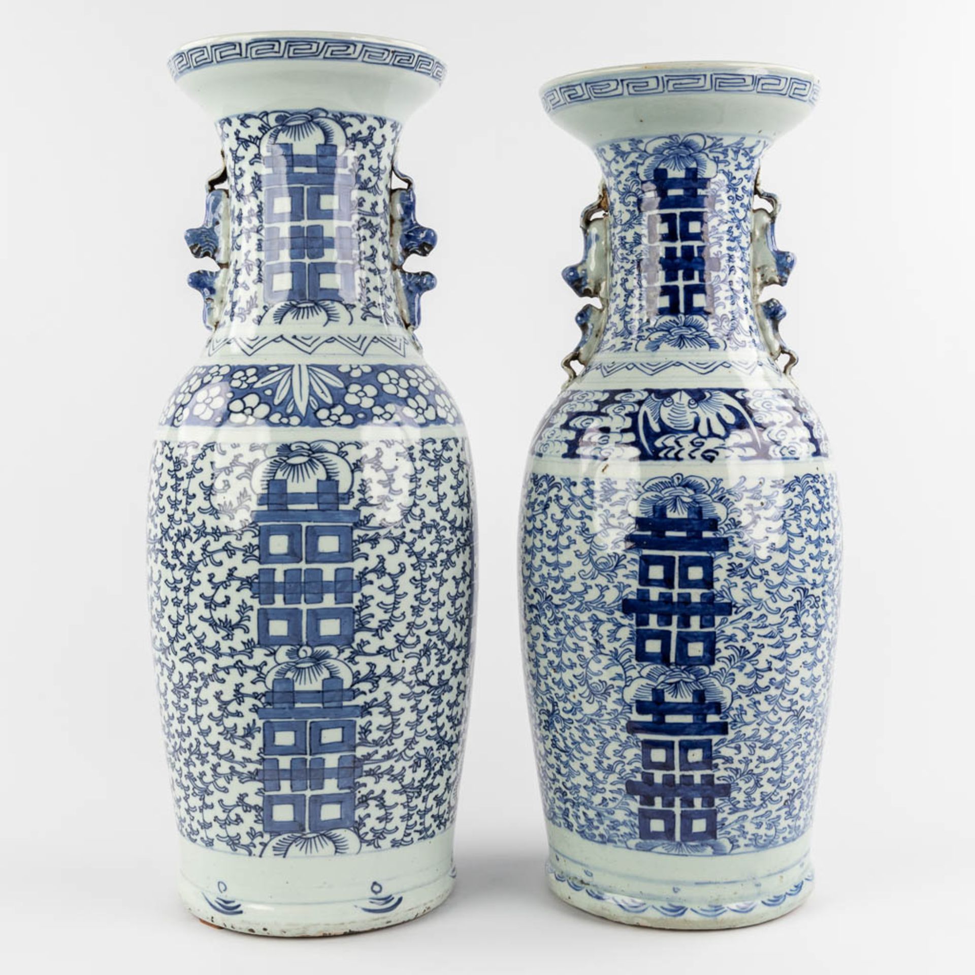 Two Chinese vases with blue-white double xi-sign of happiness. 19th/20th C. (H:60 x D:21 cm)