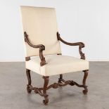 An antique armchair, sculptured wood and fabric, Louis XIV. (D:78 x W:68 x H:114 cm)