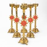 A set of 6 Church candlesticks with red IHS logo. (H:80 x D:20 cm)