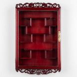 An Oriental display cabinet, 20th C. (D:8 x W:45 x H:70 cm)