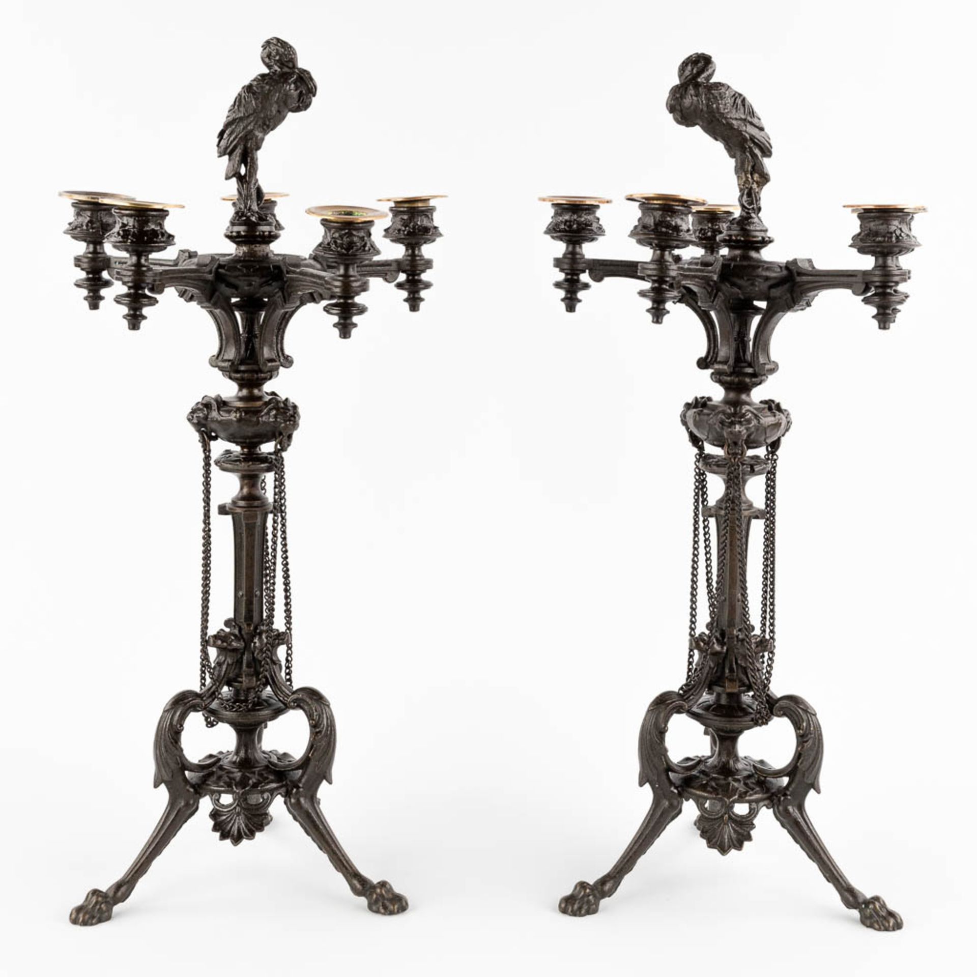 A pair of candelabra, bronze decorated with birds. 19th C. (H:56 x D:26 cm)