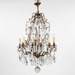 A big antique chandelier, brass and glass. France. Circa 1900. (H:105 x D:65 cm)