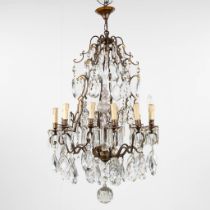 A big antique chandelier, brass and glass. France. Circa 1900. (H:105 x D:65 cm)