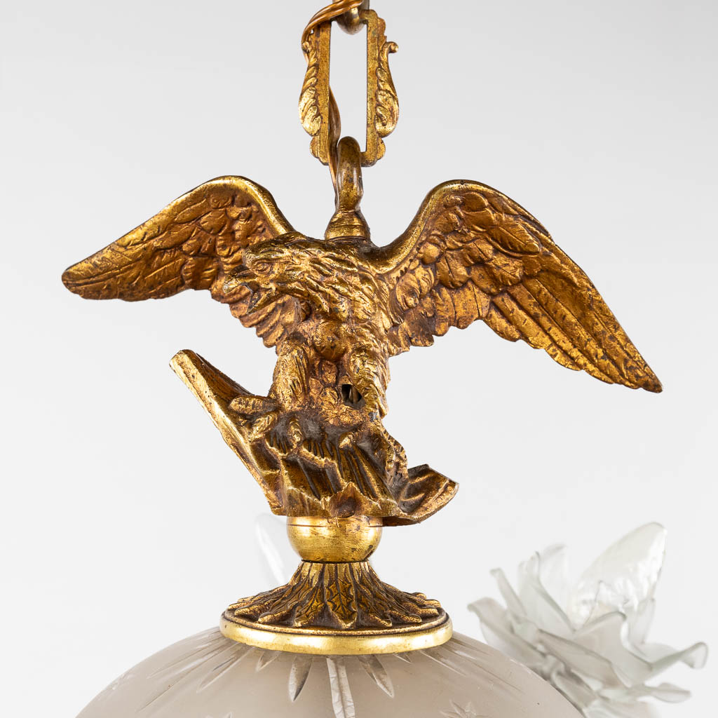 A chandelier, bronze mounted with glass and flambeaux and an eagle in Louis XVI style. (H:60 x D:44  - Bild 6 aus 12