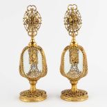 A pair of antique perfume bottles, filigree bronze and cut glass. (H:23 cm)