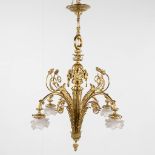 A chandelier, bronze finished with ram's heads, Louis XVI style. (H:93 x D:66 cm)