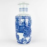 A Chinese Rolleau vase with a blue-white decor. Circa 1900. (H:46 x D:19 cm)