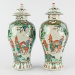A pair of Chinese Famille Verte with farmers and symbols of happiness. 20th C. (H:29 x D:13 cm)