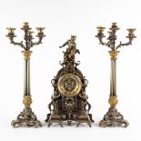A three-piece mantle garniture clock and candelabra. Clock with an image of Mercury/Hermès. 19th C.