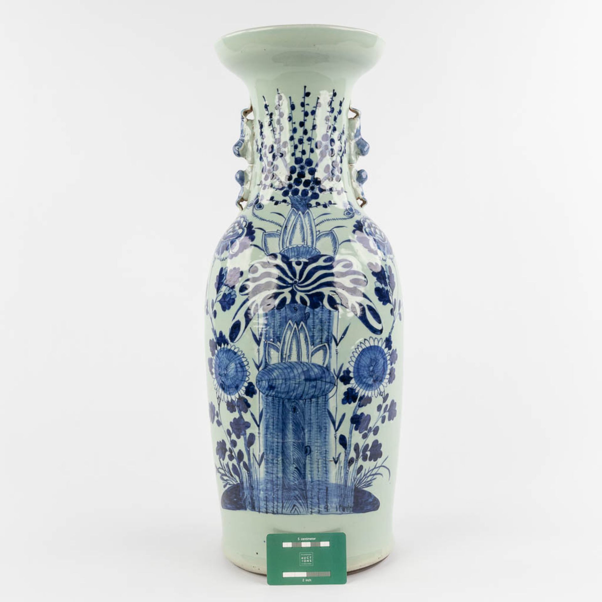 A Chinese Celadon vase with floral decor. 19th/20th C. (H:59 x D:21 cm) - Image 2 of 11