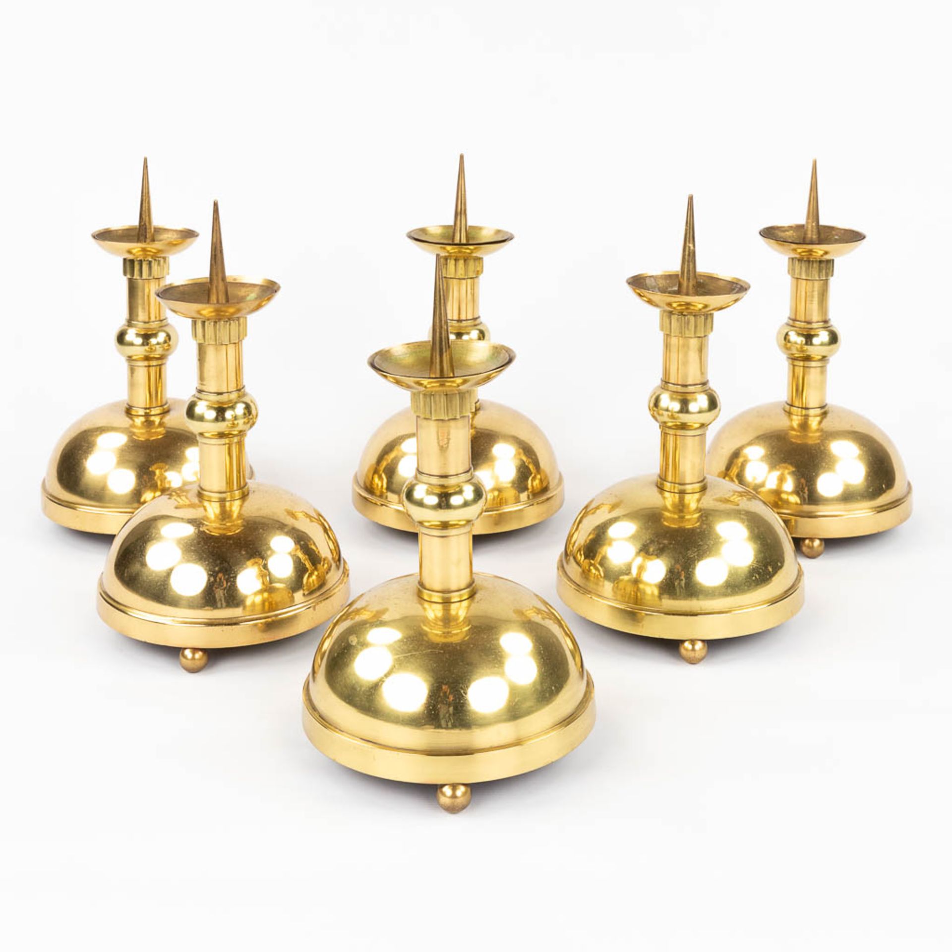 Six church chandle holders, bronze in art deco style. 20th C. (H:39 x D:22 cm)