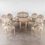 An antique 8-piece salon suite, white patinated sculptured wood in Louis XVI style. (D:60 x W:120 x