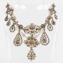 An antique necklace with pendant, silver with uncut diamonds. 19th C. (L:43 cm)