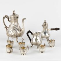 A Hot Chocolate pot, coffee pot and milk jug, 6 glass holders. Silver in Louis XV style. France. 119