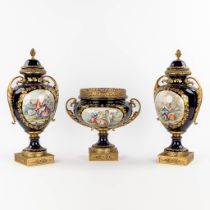 A.C.F. Svres, a three-piece mantle garniture, bowl with two vases. (L:19 x W:23 x H:48 cm)