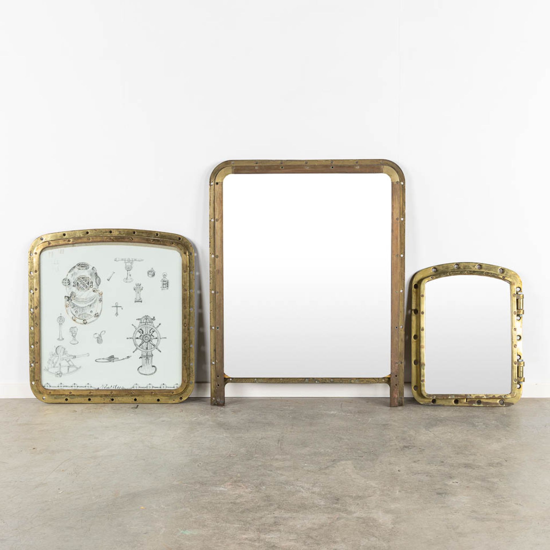 Three various Portholes, bronze and glass. Two changed into a mirror. (W:86 x H:110 cm)