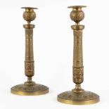 A pair of bronze candlesticks, Empire style. (H:30 x D:14 cm)