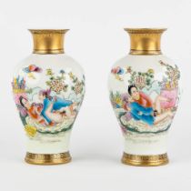 A pair of Chinese vases with an erotic scne, Qianlong mark. 20th C. (H:15 x D:9 cm)