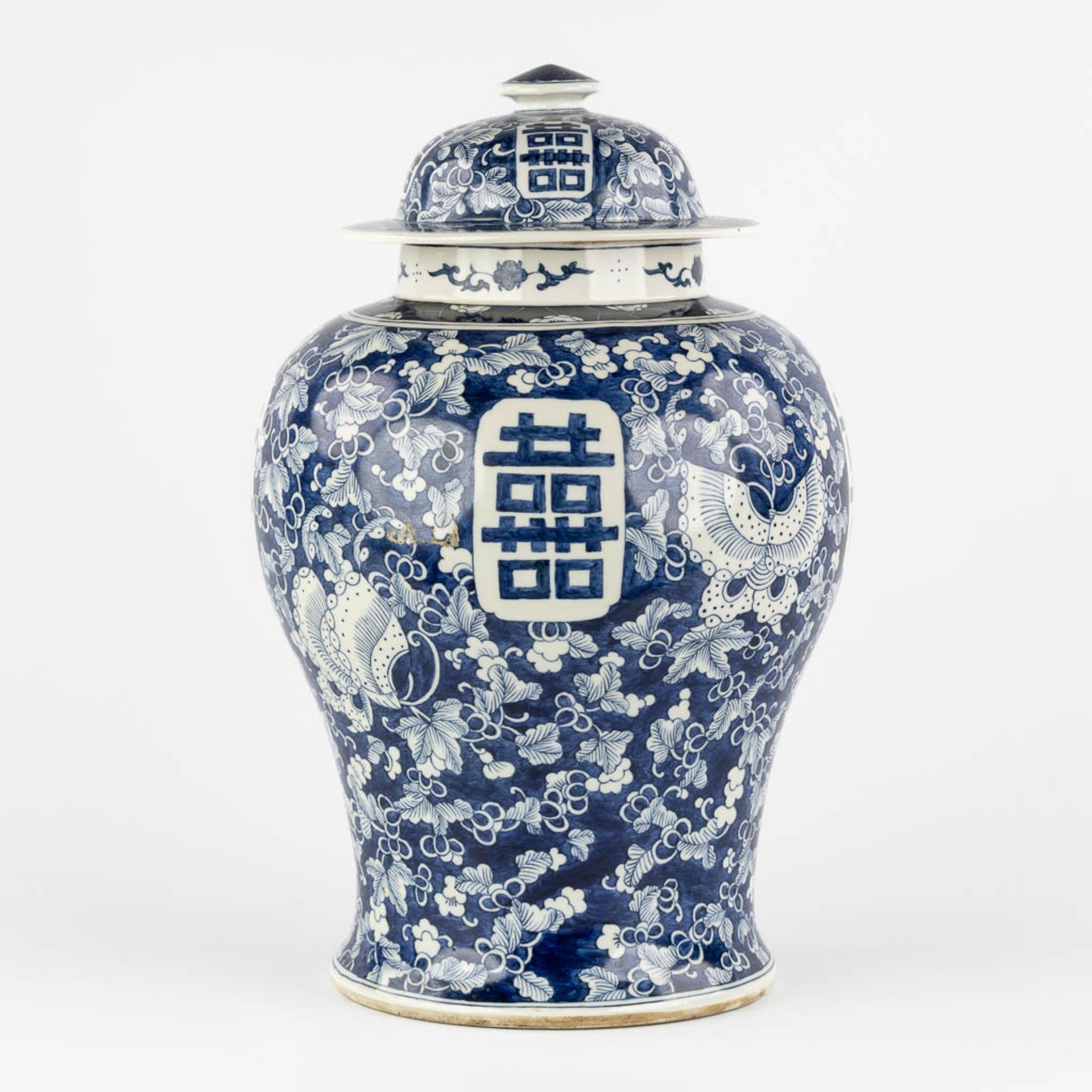 A Chinese baluster vase, blue-white with a Prunus decor and double XI sign. 19th/20th C. (H:42 x D:2 - Image 4 of 17
