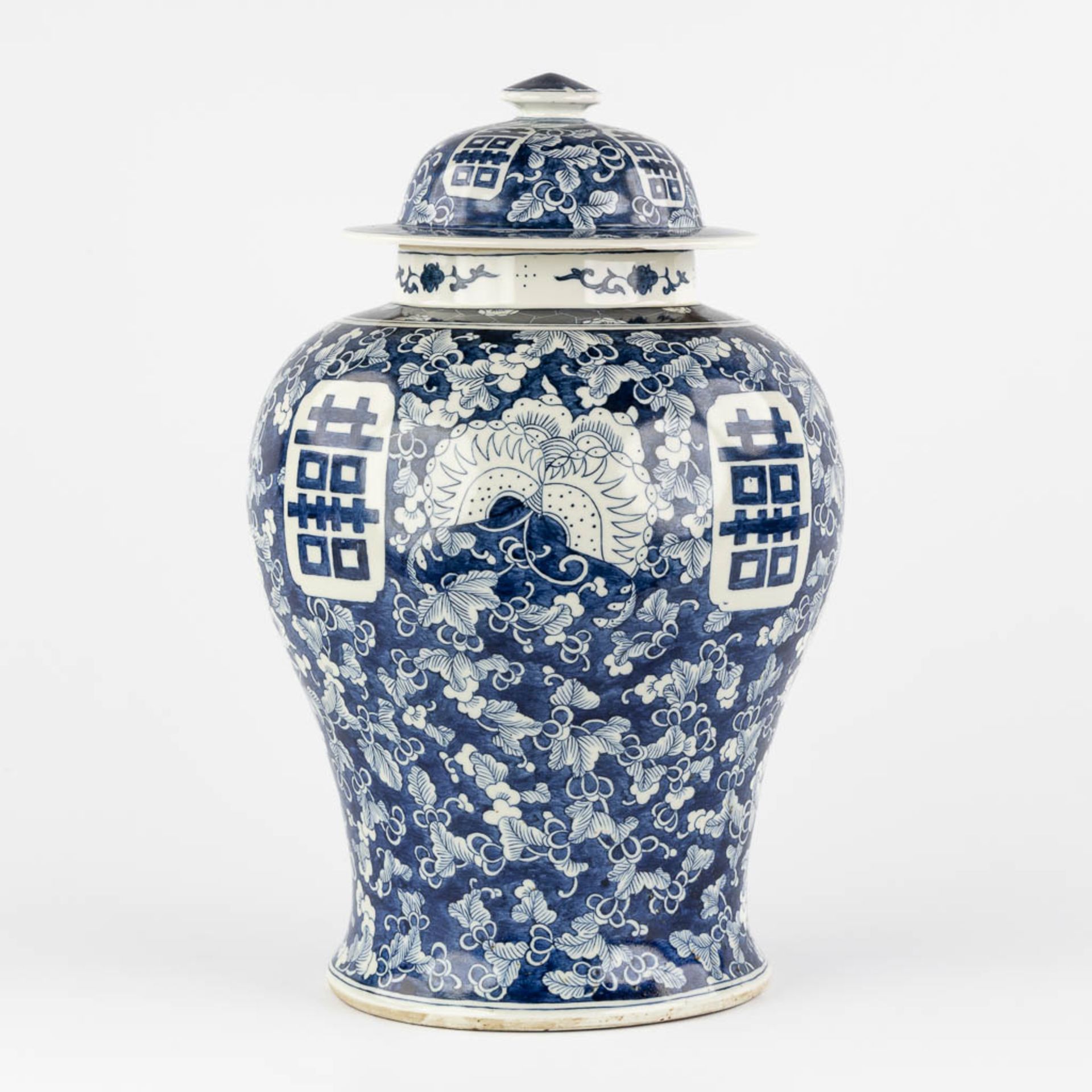 A Chinese baluster vase, blue-white with a Prunus decor and double XI sign. 19th/20th C. (H:42 x D:2 - Image 7 of 17