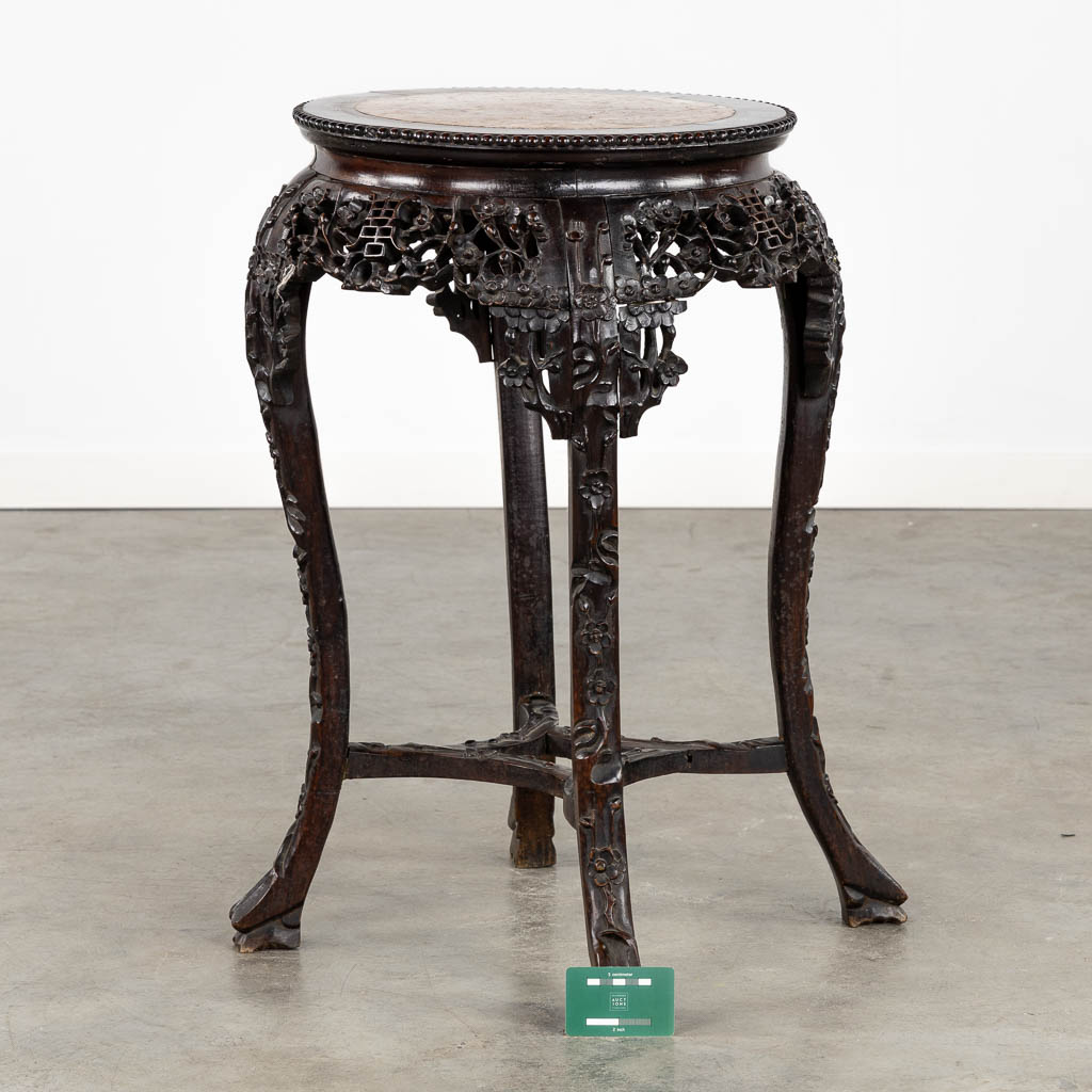 A richly sculptured Chinese hardwood side table or pedestal with a marble. (H:71 x D:53 cm) - Image 2 of 12