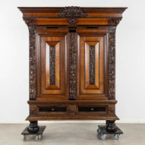 An antique 'Dutch pillow cabinet', ebonised wood, 19th C. (L:74 x W:182 x H:210 cm)