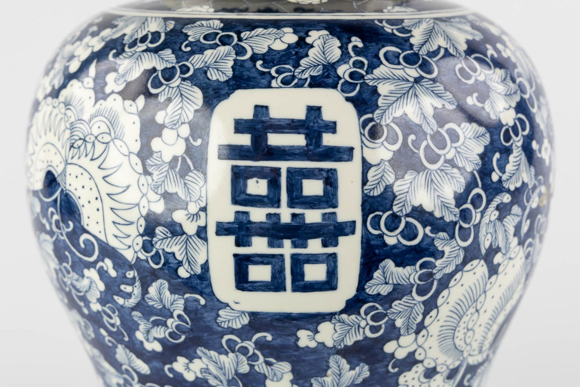 A Chinese baluster vase, blue-white with a Prunus decor and double XI sign. 19th/20th C. (H:42 x D:2 - Image 15 of 17