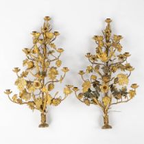 A pair of candelabra, brass in a gothic revival style and decorated with wheat, vines and flowers. C