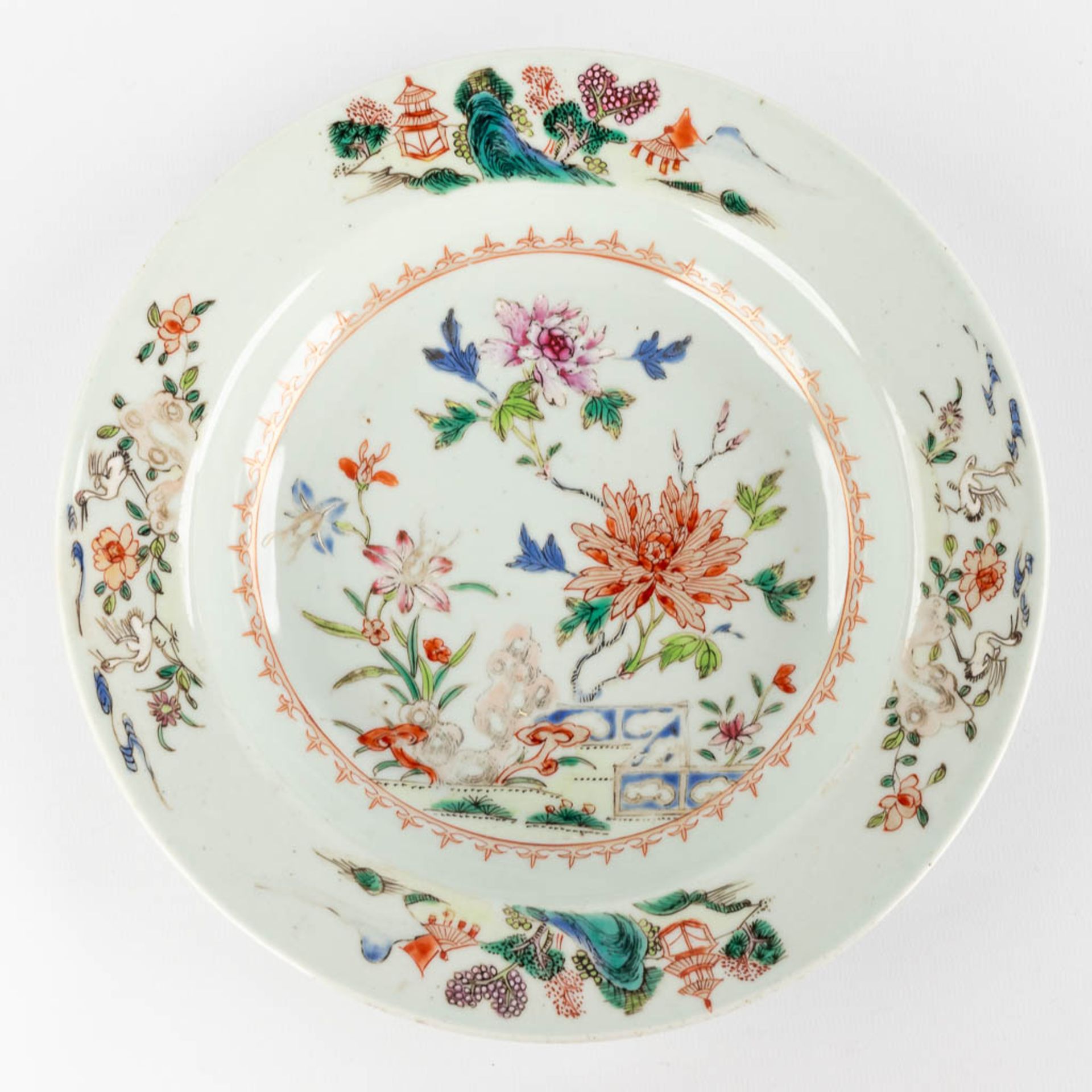 Three Chinese Famille Rose plates with a floral decor. 19th C. (D:22,5 cm) - Image 7 of 11